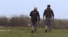 NFU Mutual Agent in field with farmer and gun dog