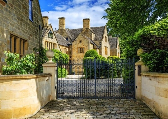 affluent house with wrought iron gates