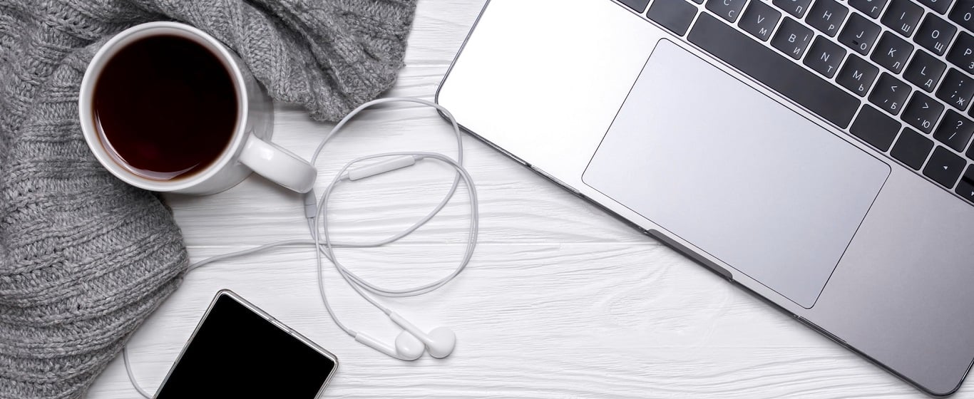 Coffee laptop and mobile phone on desk