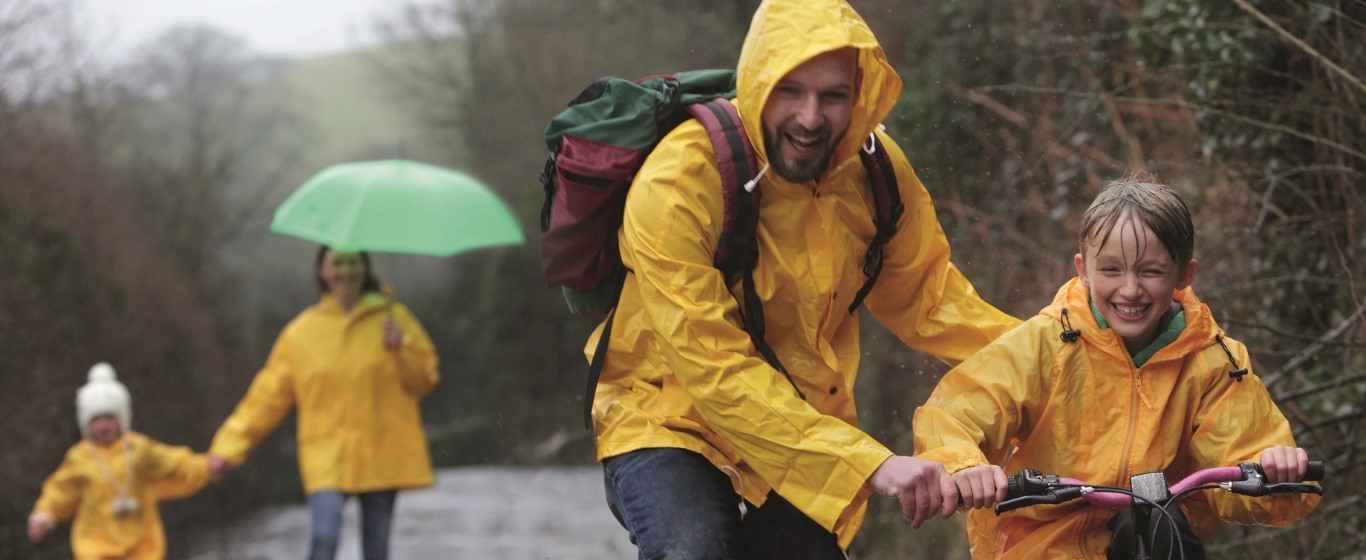 family-in-the-rain