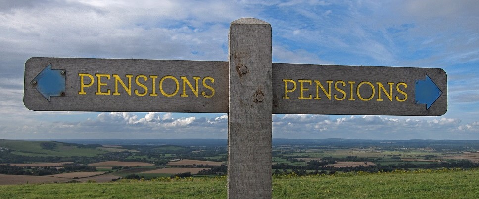 pension sign post in a field
